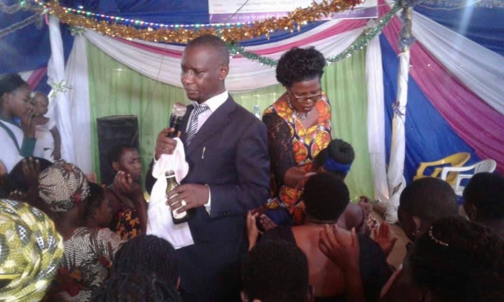 A pastor preaching to the congregation during a service