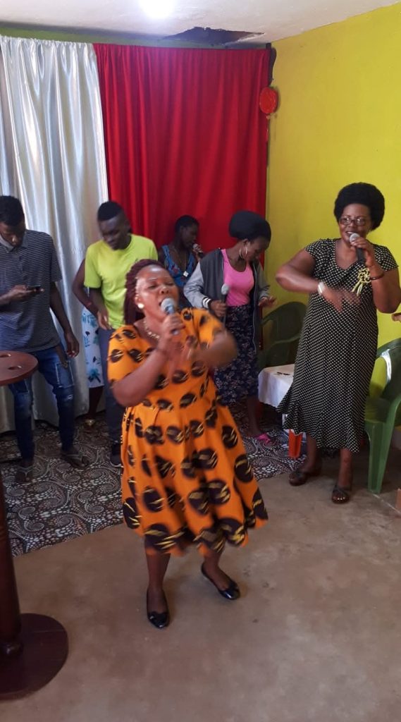 A worship leader singing during a Sunday service