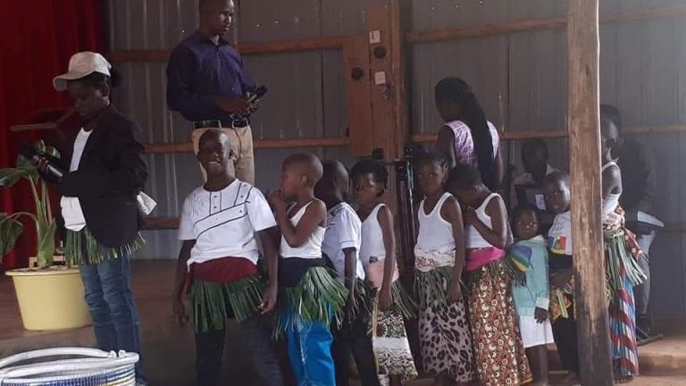 Young people in traditional dress at a youth ministry event