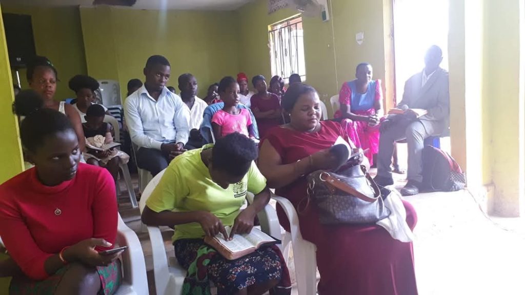 Church members meeting together in a community fellowship group